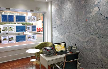 estate agent office with wallpaper map