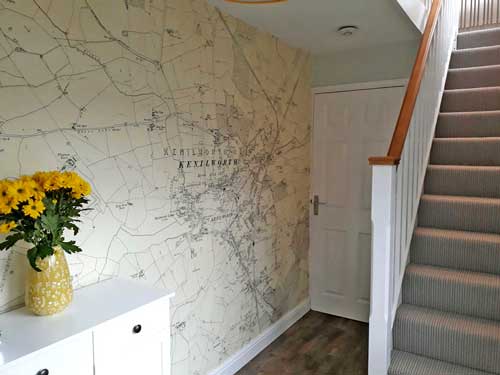 historic map wallpaper in hallway